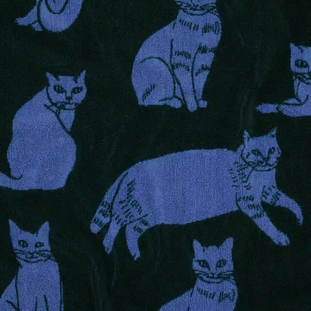 Close up of a bath towel featuring BAGGU's Cats design