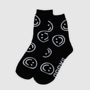 A pair of BAGGU crew socks in Black Happy