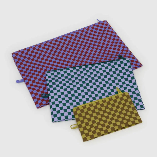 A BAGGU three Go Pouch Set in Jewel Checks laid flat