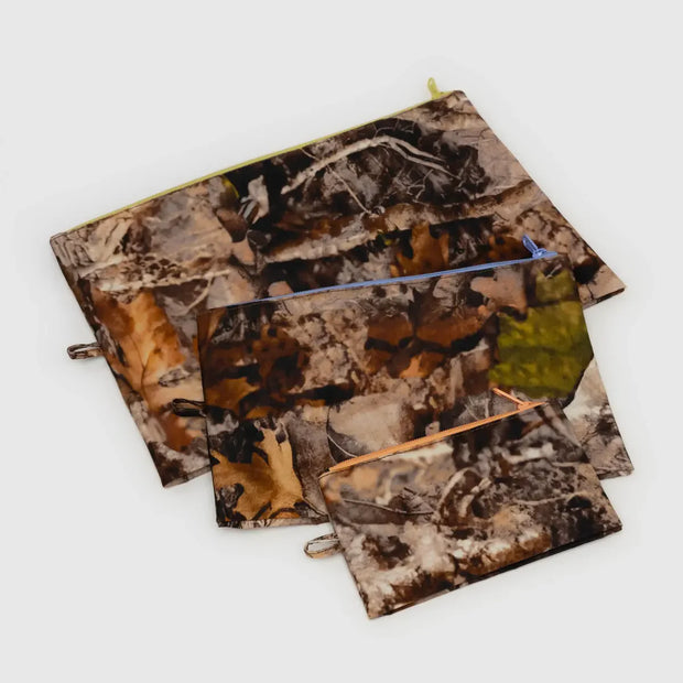A BAGGU three Go Pouch Set in Photo Forest laid flat