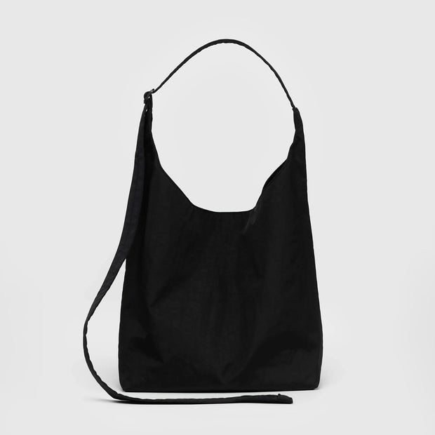 A large nylon sling bag from Baggu in black