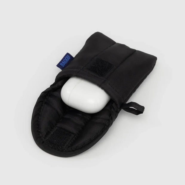 A BAGGU puffy earbud or headphone case in Black shown open