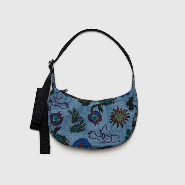 A small Crescent Bag from Baggu in Digital Denim Birds