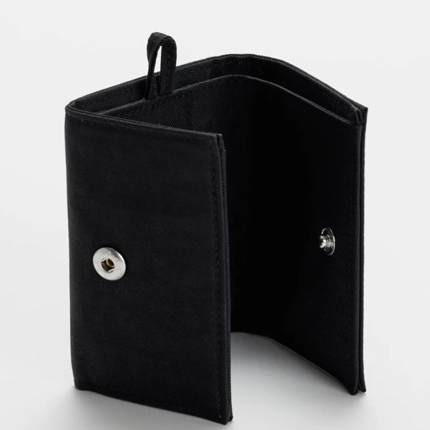 An open Baggu Snap Wallet in Black