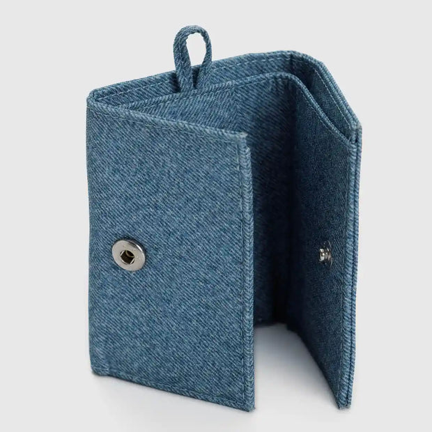 An open Baggu Snap Wallet in Digital Denim