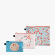 A LOQI x Smiley Zip Pocket Set featuring Blossom & Geometric Smiley designs